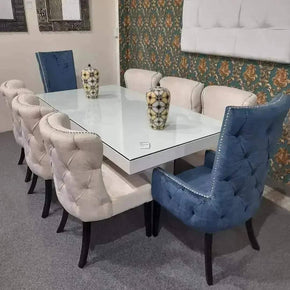 White Marble Dining Table with 6 Chairs and Tufted Back Design