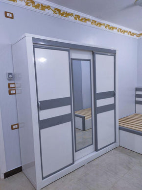 Wardrobe with Border Design and Glass Center Panels